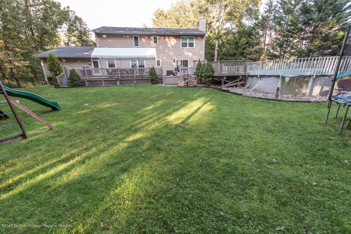 138 Frank Applegate Road Jackson, NJ 08527 - Photo 44 of 47 a view of a house with a yard deck and sitting area