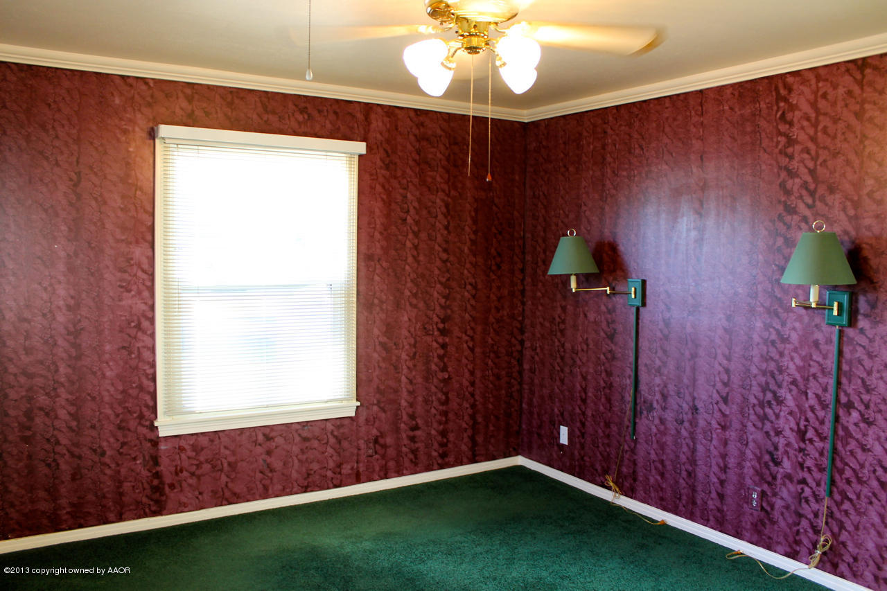 4101 Cline Road Amarillo, TX 79110 - Photo 12 of 27 a view of an empty room with a window