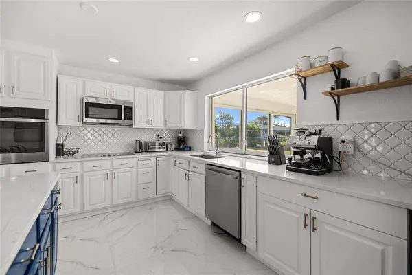 a view of a dining room with furniture