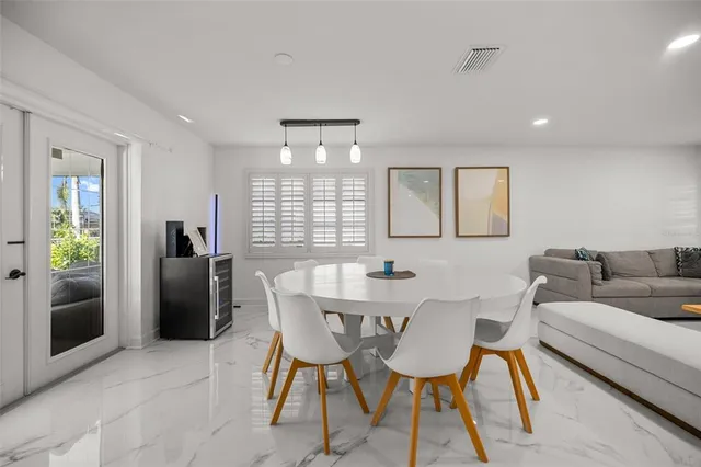 a view of a dining room with furniture