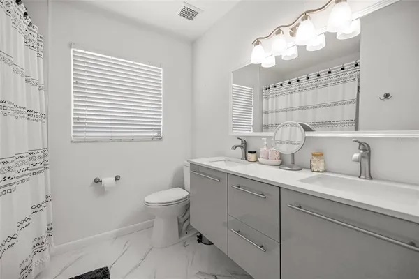 a view of a workspace with furniture