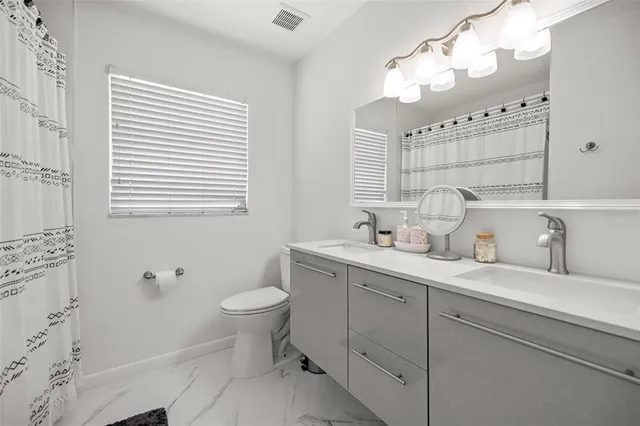 a view of a workspace with furniture