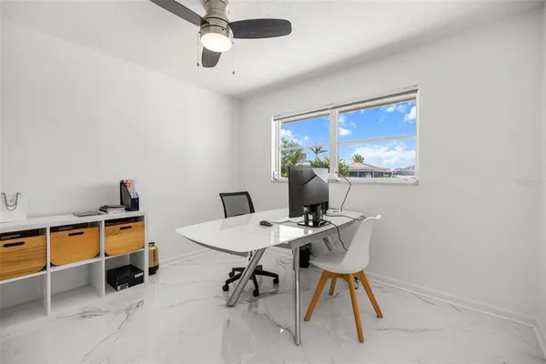 a room with furniture and wooden floor