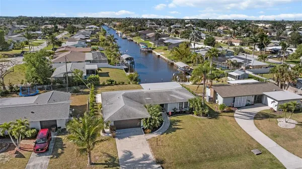 an aerial view of a house with a garden