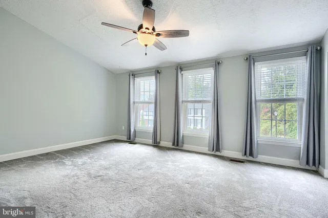 a view of bathroom with a window