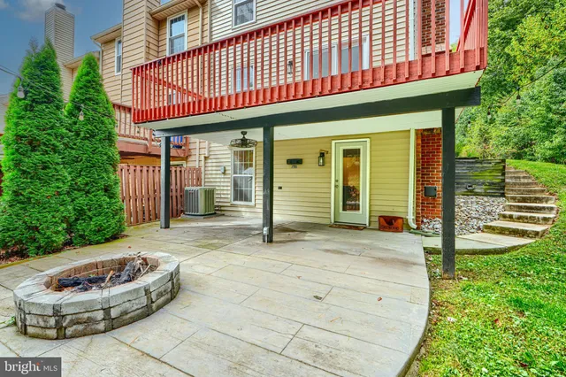 a front view of a house with a outdoor seating