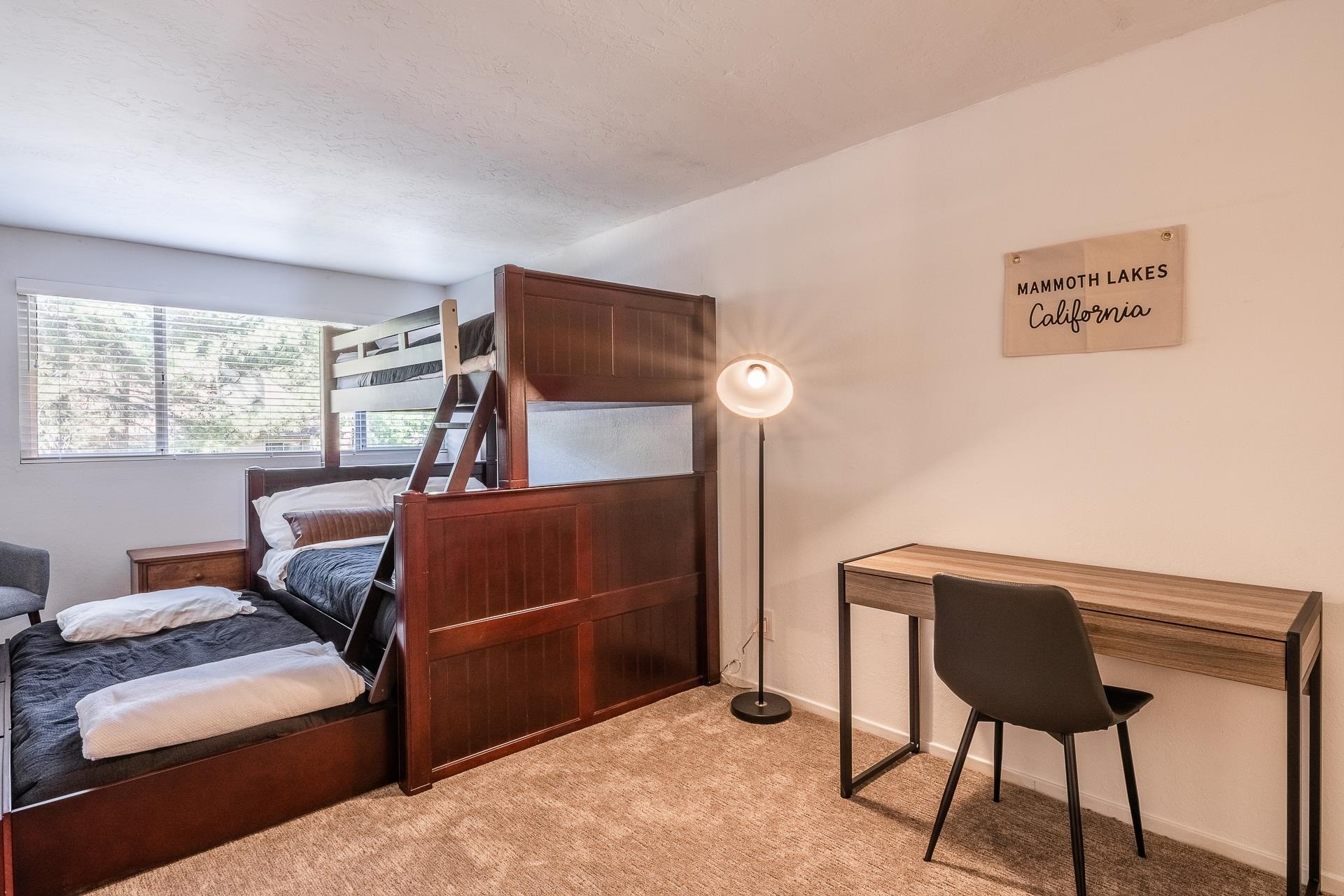 2289 Sierra Nevada Road, Unit J8 Mammoth Lakes, CA 93546 - Photo 24 of 30 Bedroom with light colored carpet and baseboards