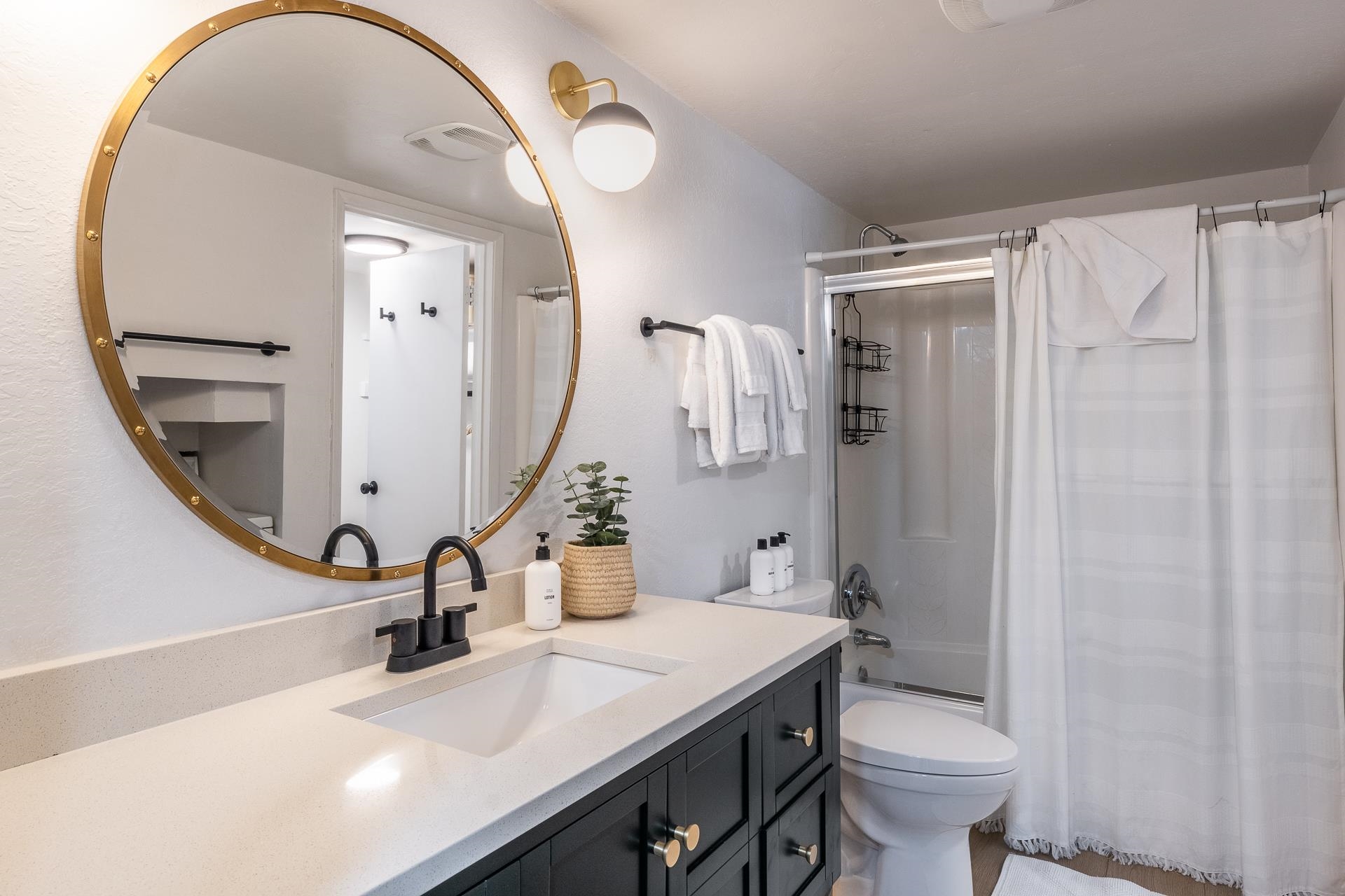 2289 Sierra Nevada Road, Unit J8 Mammoth Lakes, CA 93546 - Photo 5 of 30 Bathroom featuring shower / bathtub combination with curtain and vanity