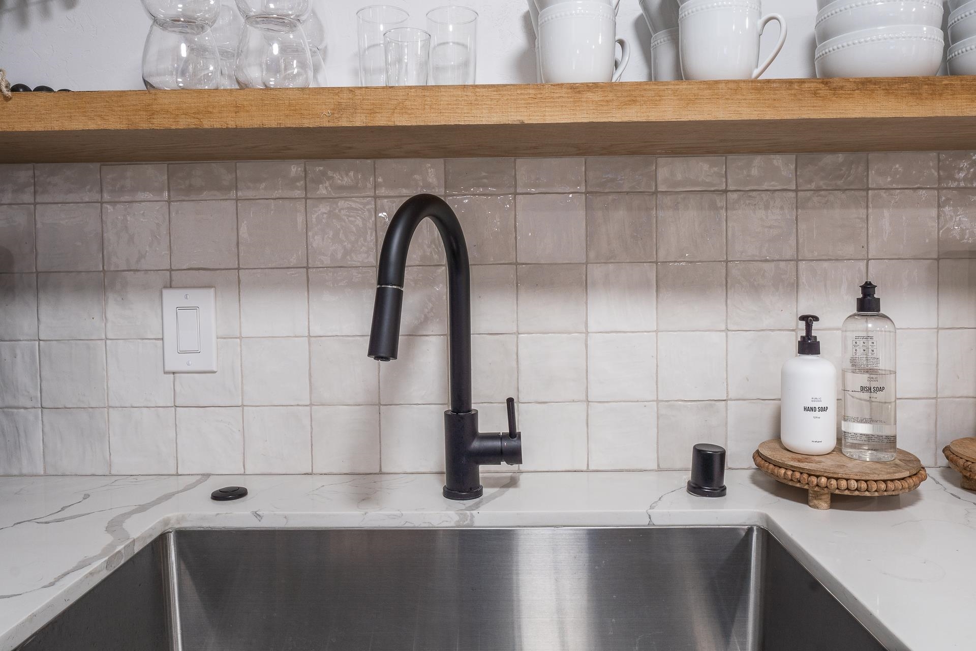 2289 Sierra Nevada Road, Unit J8 Mammoth Lakes, CA 93546 - Photo 10 of 30 Kitchen view of light stone countertops and backsplash