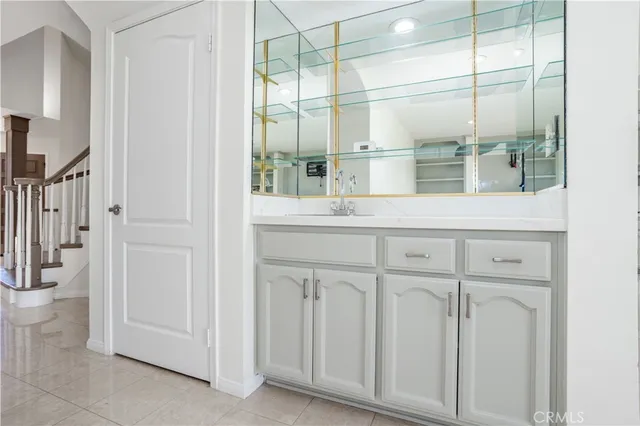 a bathroom with a shower and a sink