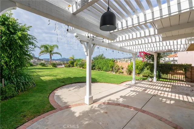 a view of a porch with a garden