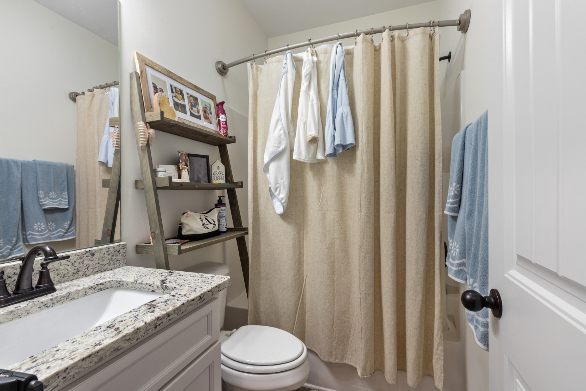 1159 Oak Grove Road Dickson, TN 37055 - Photo 16 of 29 a bathroom with a granite countertop sink toilet and shower