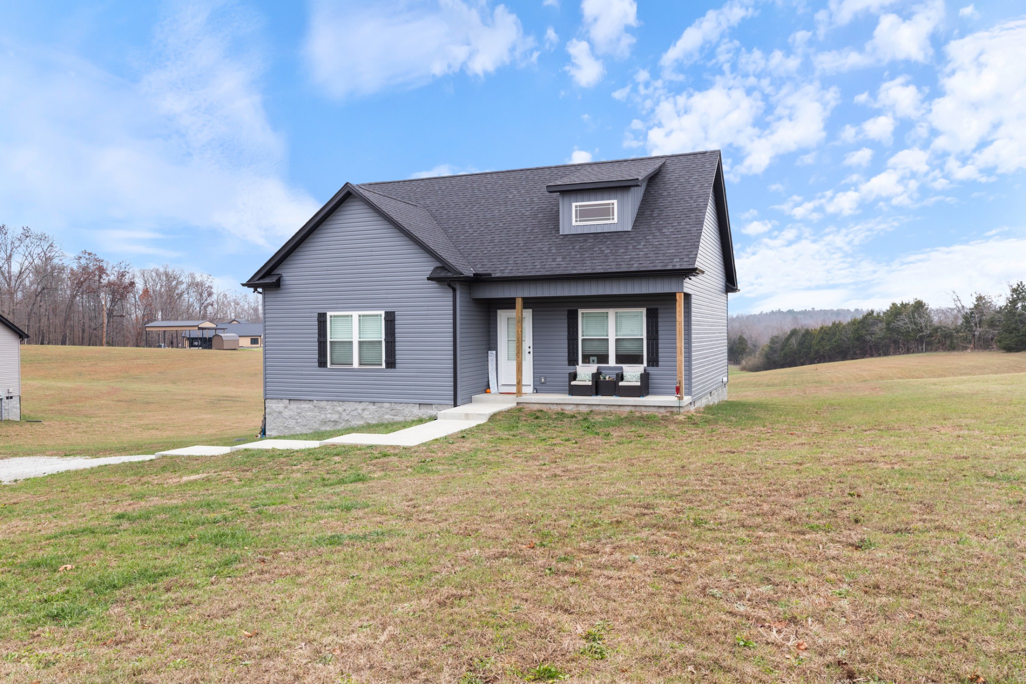 1159 Oak Grove Road Dickson, TN 37055 - Photo 2 of 29 a view of a house with a ocean view