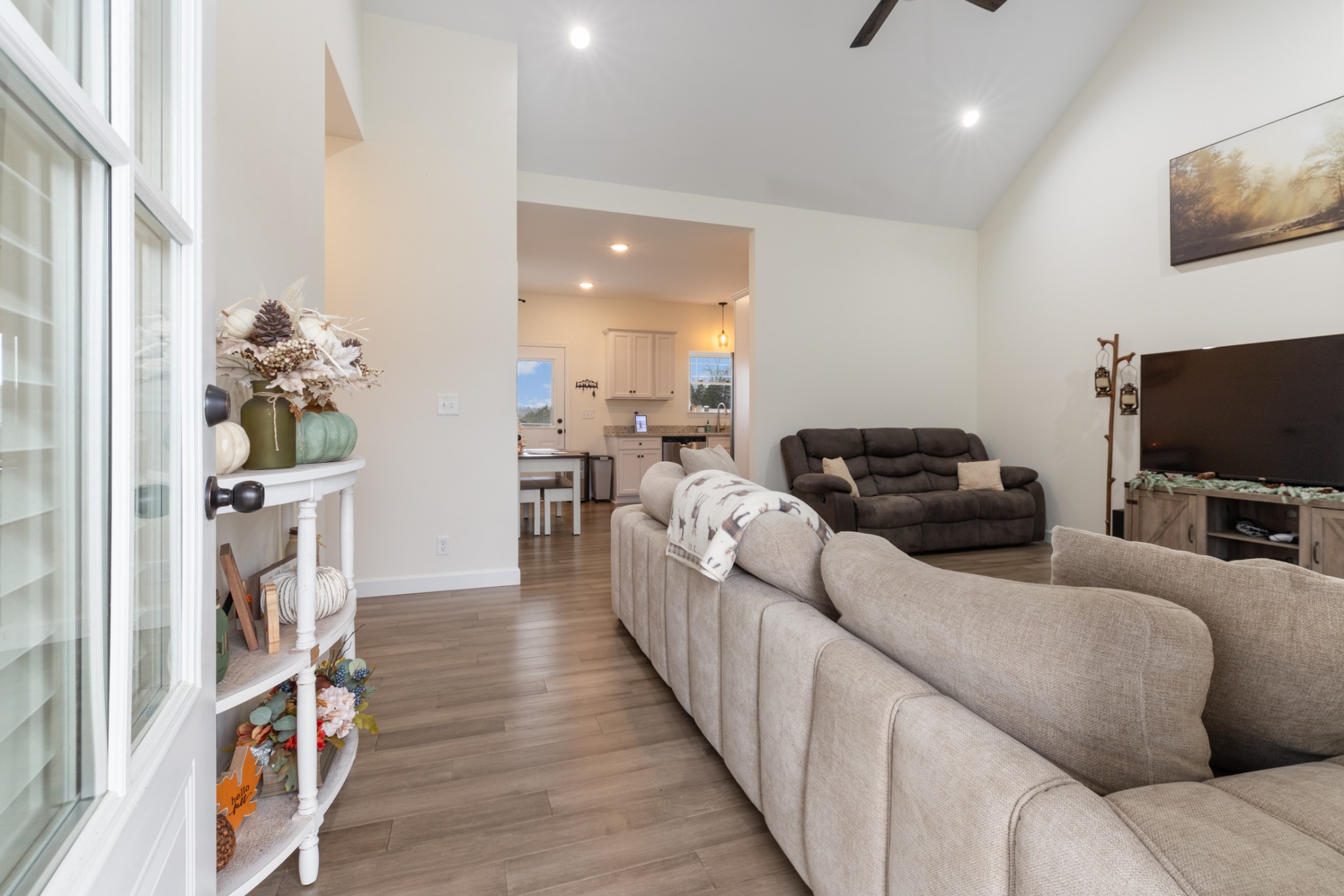 1159 Oak Grove Road Dickson, TN 37055 - Photo 6 of 29 a living room with furniture and a flat screen tv