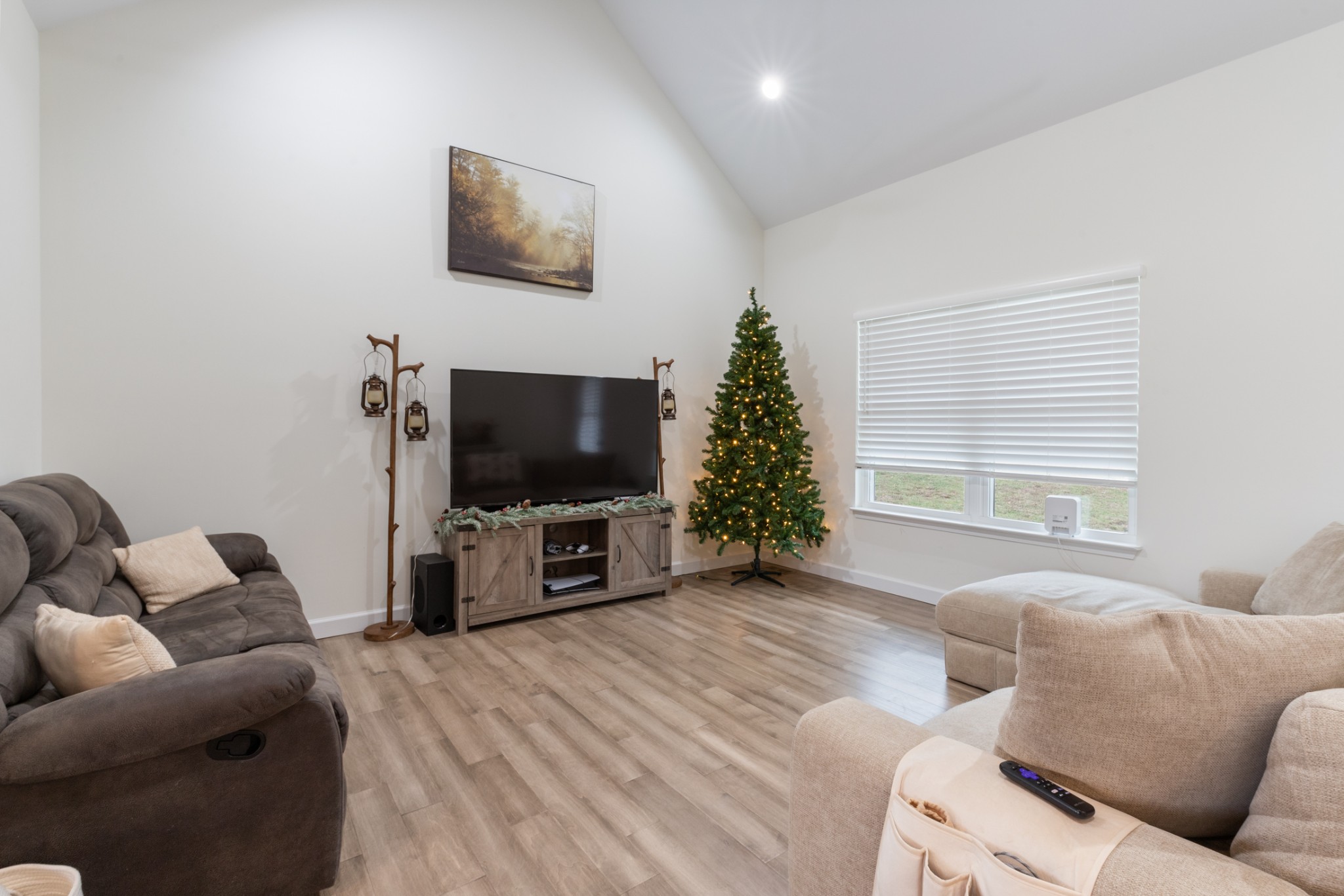 1159 Oak Grove Road Dickson, TN 37055 - Photo 7 of 29 a living room with furniture and a flat screen tv