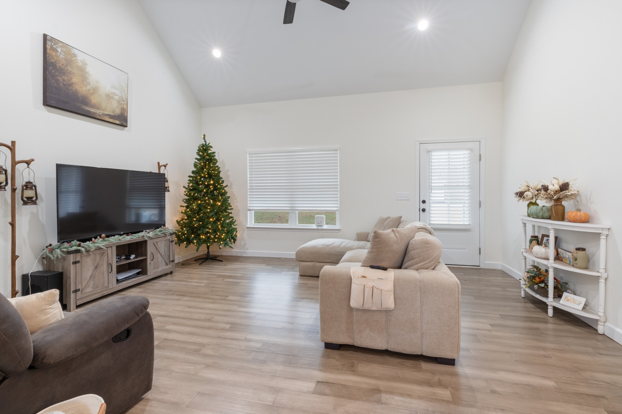 1159 Oak Grove Road Dickson, TN 37055 - Photo 9 of 29 a living room with furniture and a flat screen tv