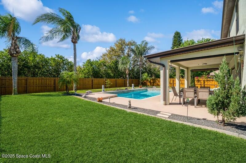 1192 Winding Meadows Road Rockledge, FL 32955 - Photo 29 of 31 30_1192WindingMeadowsRd_26_BackYard_Flex