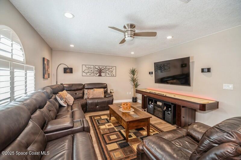 1192 Winding Meadows Road Rockledge, FL 32955 - Photo 8 of 31 08_1192WindingMeadowsRd_3_FamilyRoom_Fle