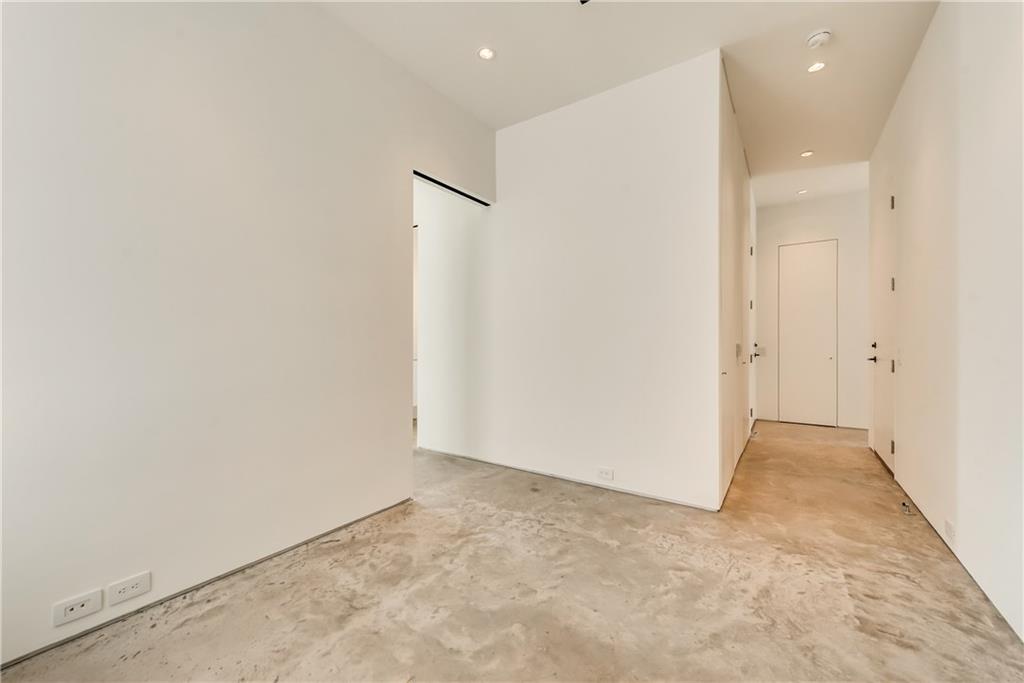 1504 Burlew Street, Unit 4 Dallas, TX 75204 - Photo 24 of 30 an empty room with an entryway