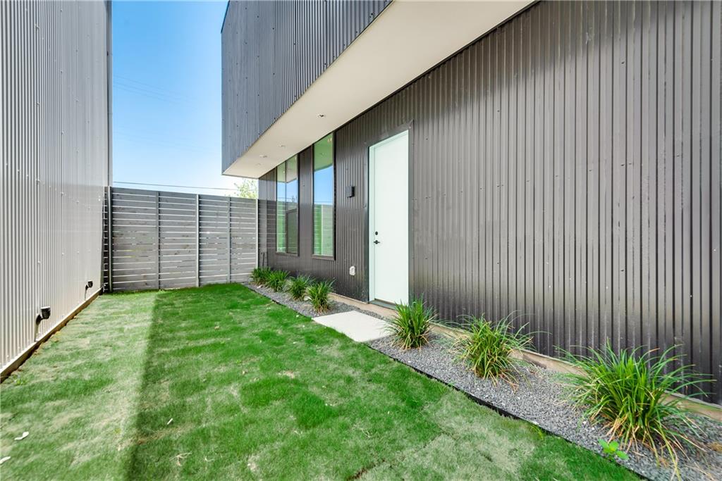 1504 Burlew Street, Unit 4 Dallas, TX 75204 - Photo 27 of 30 a view of a backyard with plants