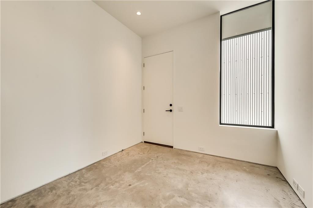 1504 Burlew Street, Unit 4 Dallas, TX 75204 - Photo 28 of 30 an empty room with windows