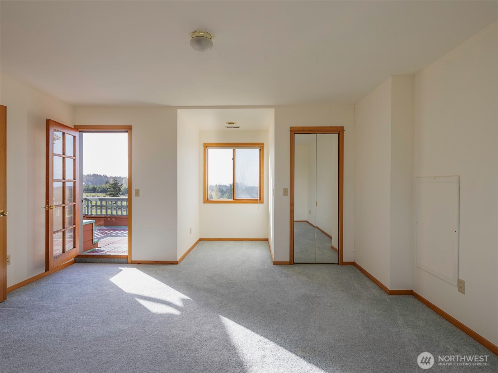 2594 Happy Valley Road Sequim, WA 98382 - Photo 23 of 35 an empty room with windows