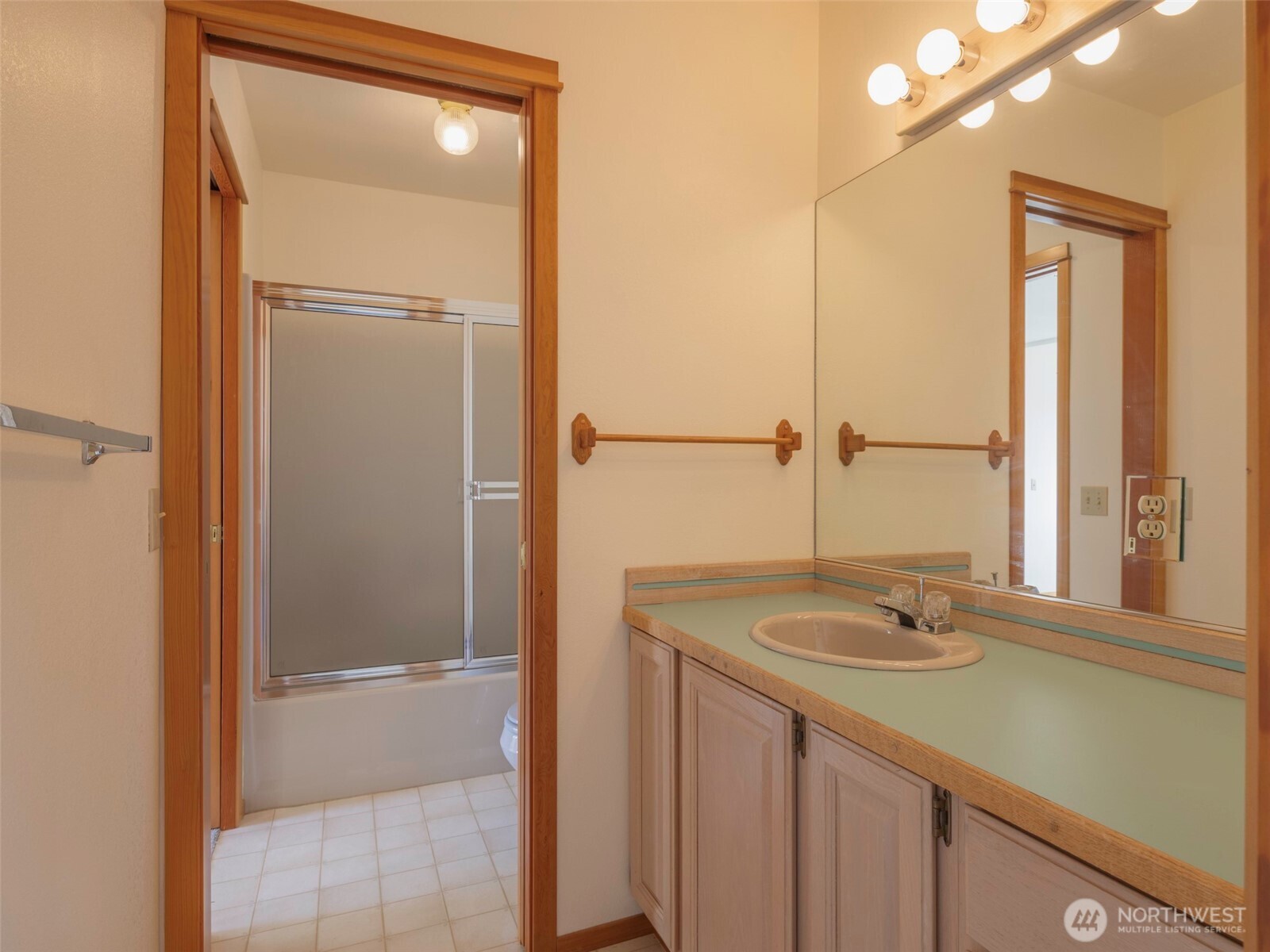 2594 Happy Valley Road Sequim, WA 98382 - Photo 25 of 35 a bathroom with a sink and a mirror