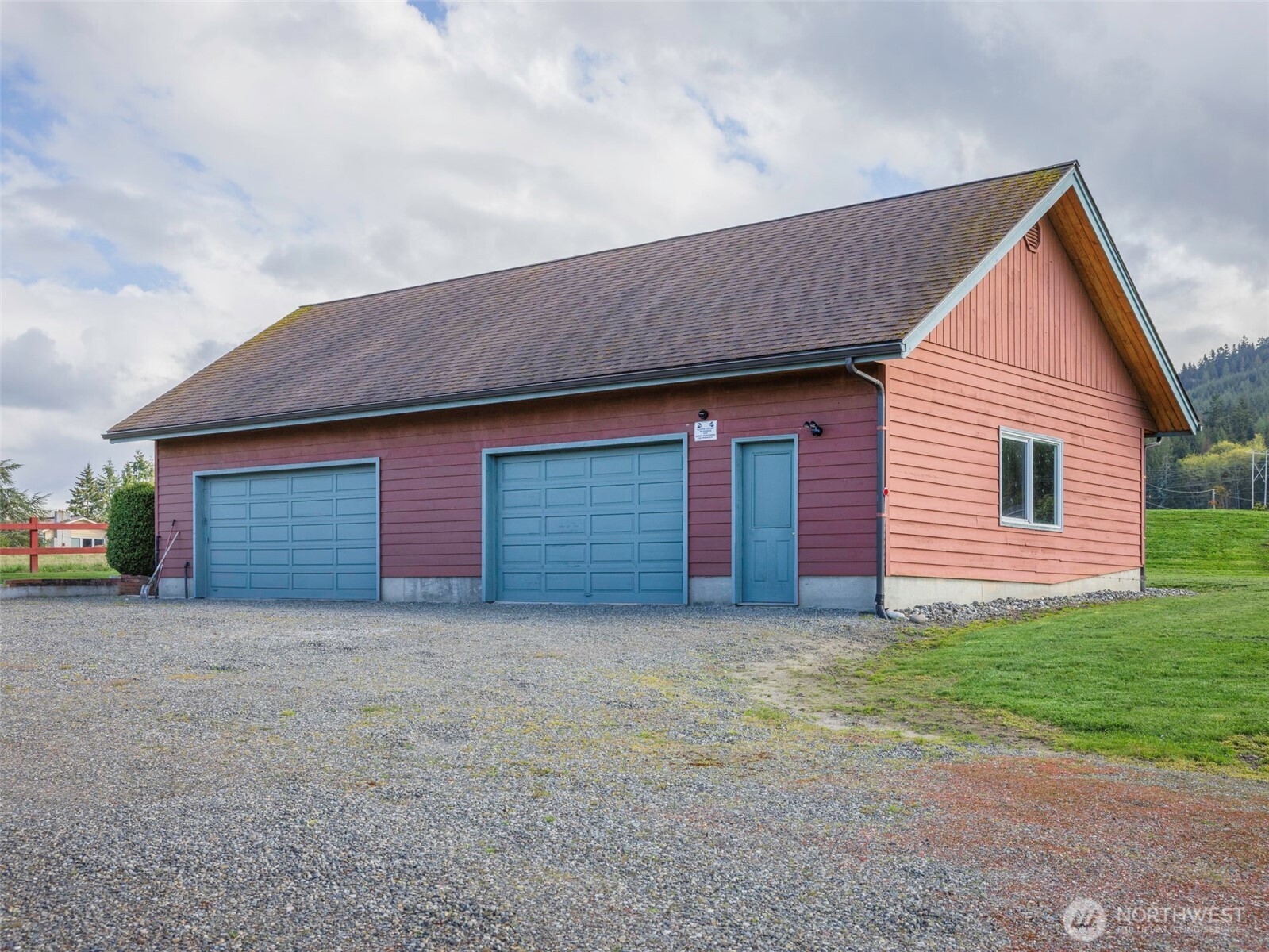 2594 Happy Valley Road Sequim, WA 98382 - Photo 32 of 35 a front view of house with yard and garage