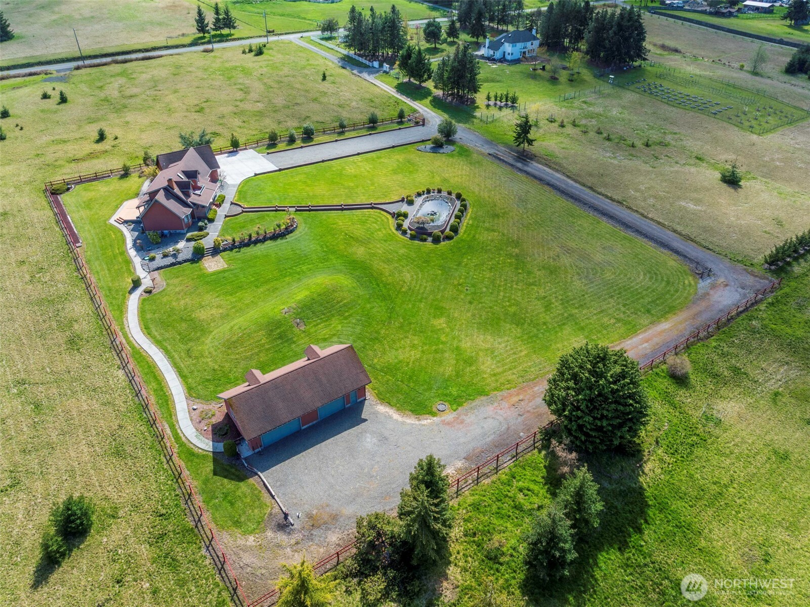 2594 Happy Valley Road Sequim, WA 98382 - Photo 34 of 35 a view of a yard with an outdoor seating
