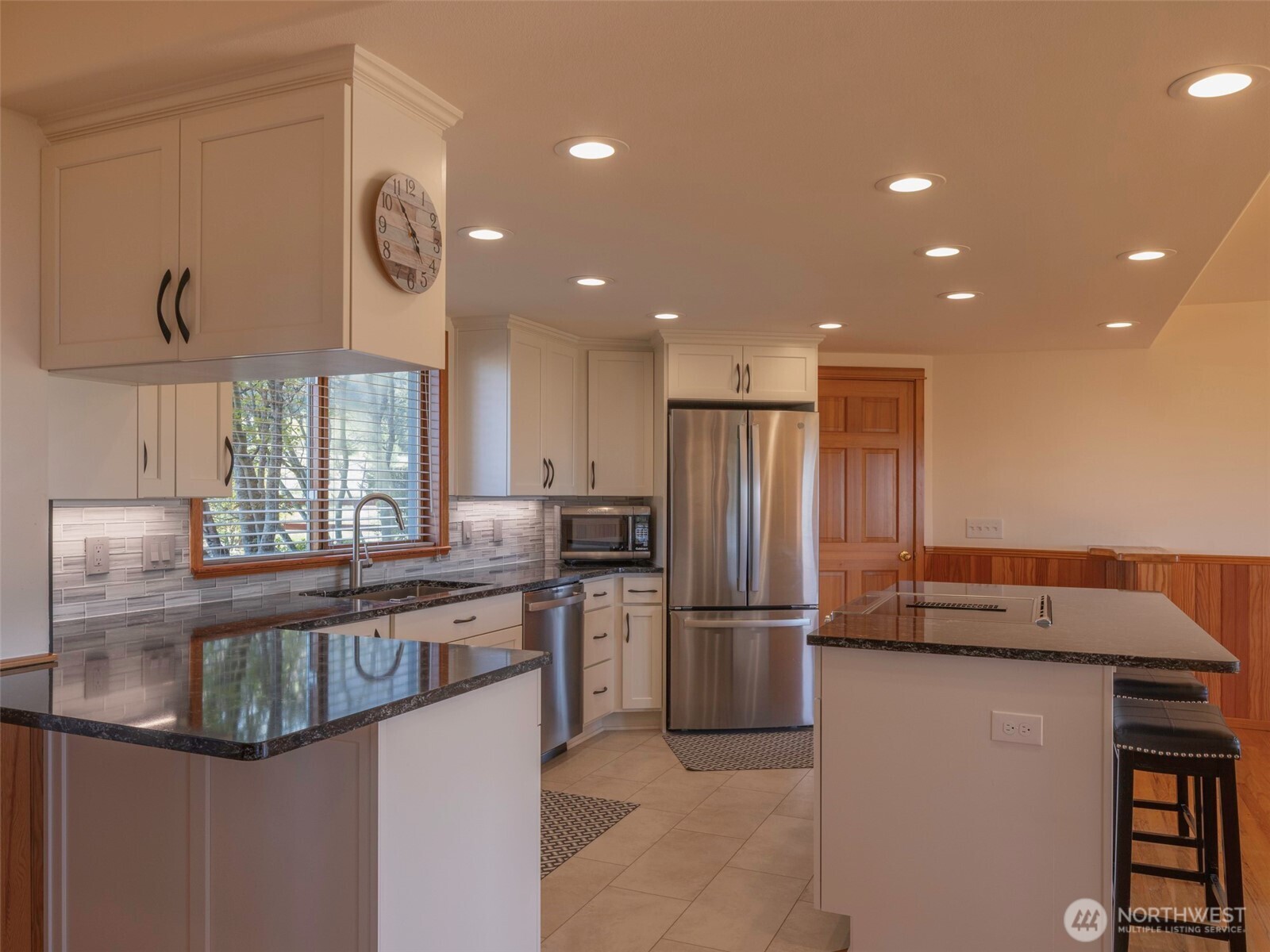2594 Happy Valley Road Sequim, WA 98382 - Photo 9 of 35 a kitchen with stainless steel appliances granite countertop a refrigerator and a stove top oven