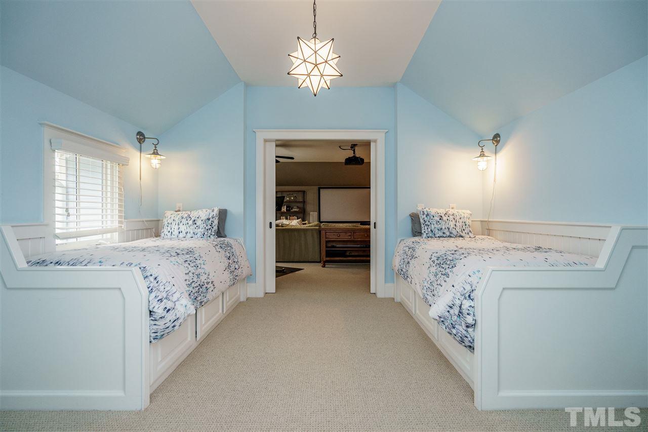 2105 Blue Oak Terrace Raleigh, NC 27608 - Photo 22 of 27 This charming sleeping room is located within the bonus room.