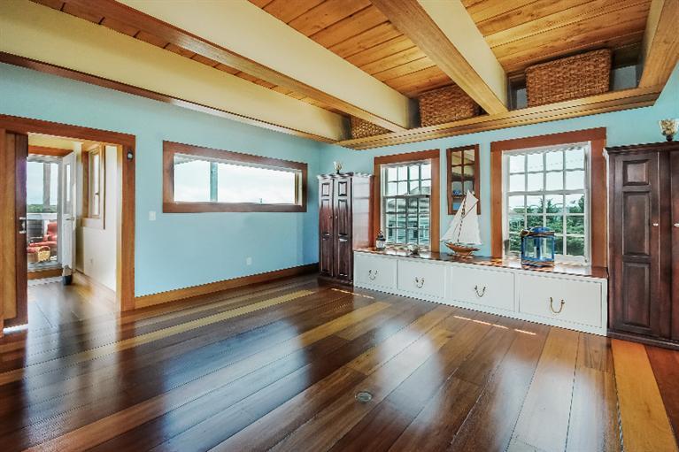 26 Short Beach Road Centerville, MA 02632 - Photo 19 of 34 a view of an empty room with wooden floor and a window