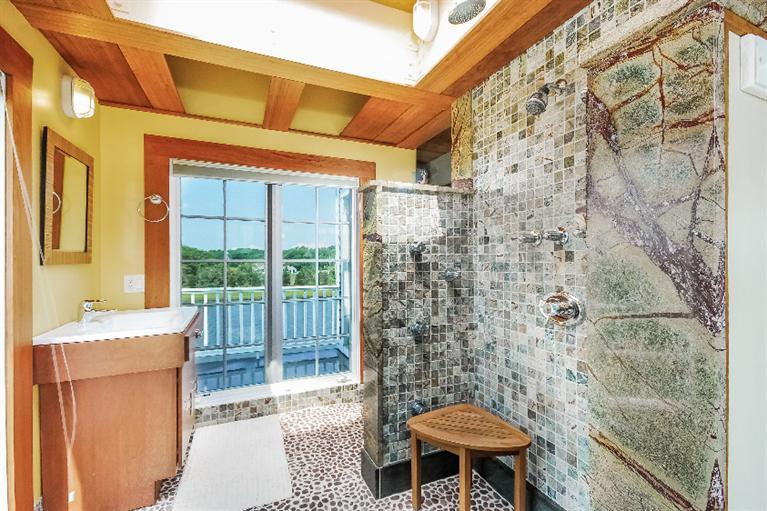 26 Short Beach Road Centerville, MA 02632 - Photo 20 of 34 a bathroom with a toilet and a shower