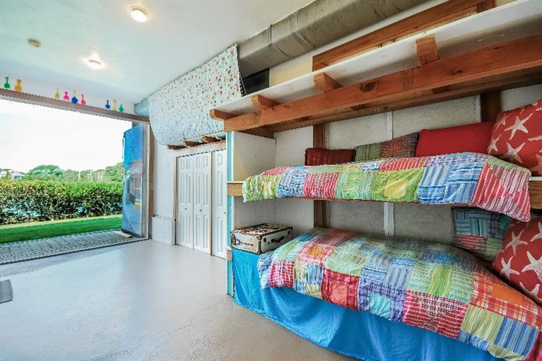 26 Short Beach Road Centerville, MA 02632 - Photo 24 of 34 a room with lots of furniture and a flat screen tv