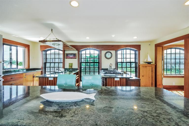 26 Short Beach Road Centerville, MA 02632 - Photo 7 of 34 an outdoor space with a large window