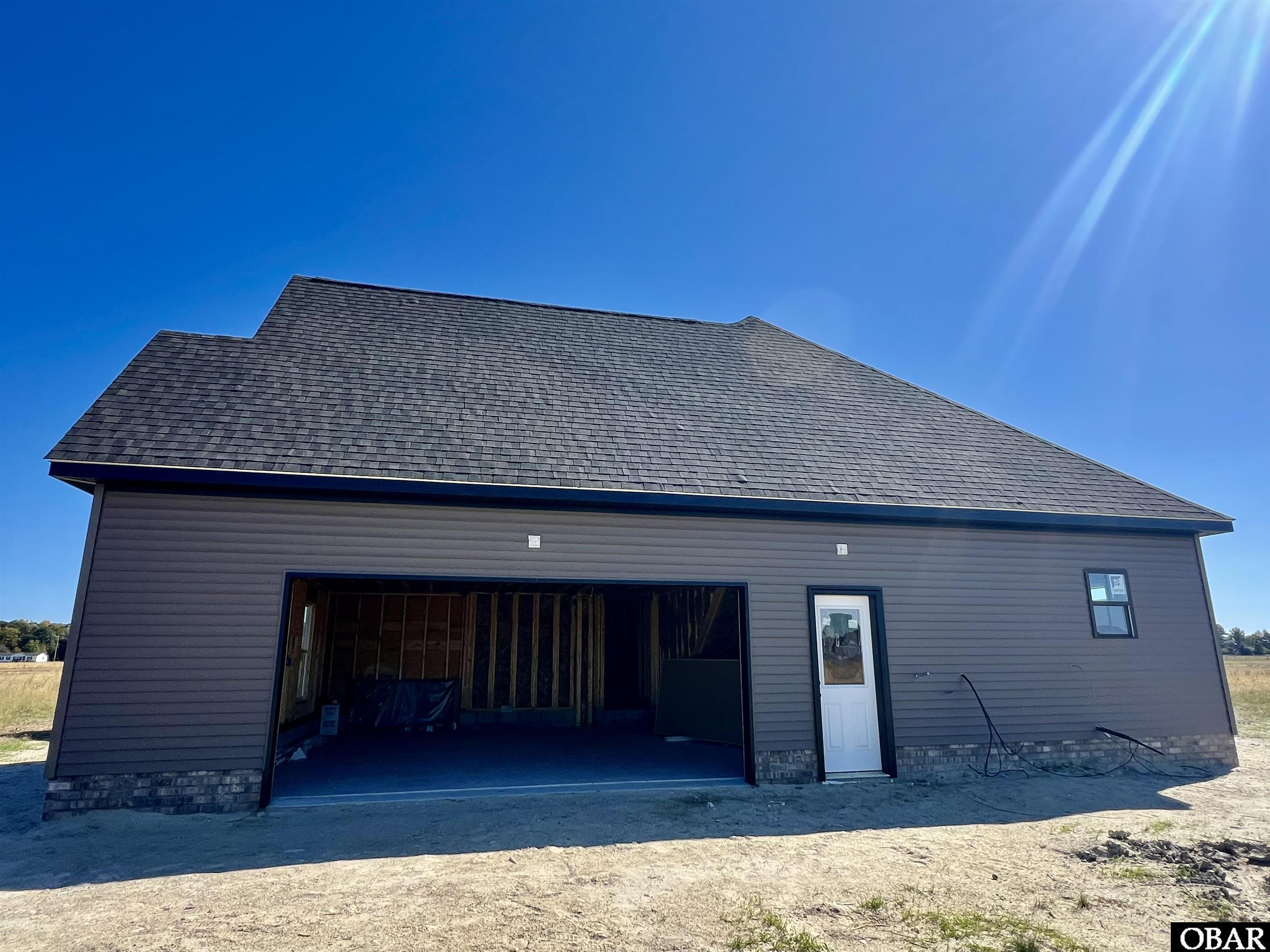491 North Trotman Road Camden, NC 27921 - Photo 5 of 22 Side Loading 2 Car Garage
