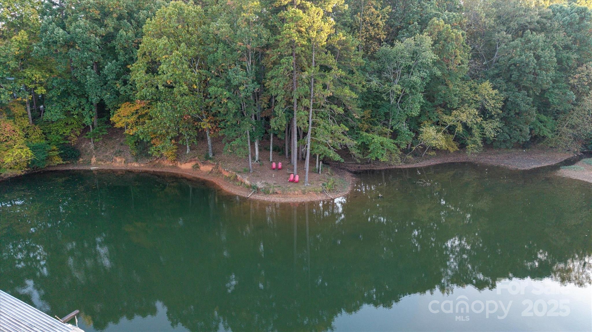 212 Riverview Terrace Clover, SC 29710 - Photo 20 of 48 a view of a lake from a yard