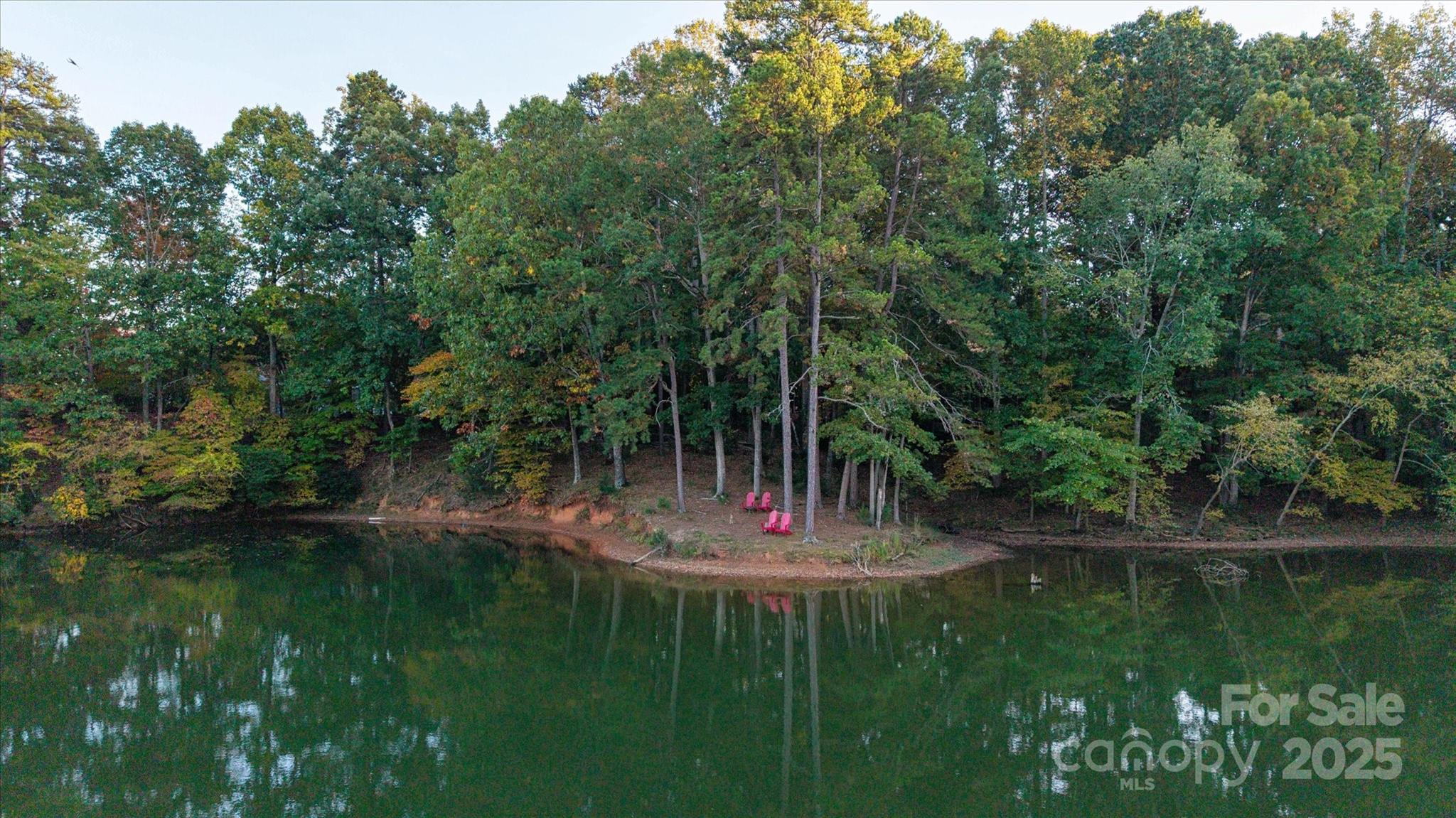 212 Riverview Terrace Clover, SC 29710 - Photo 21 of 48 a view of a water pond with green yard