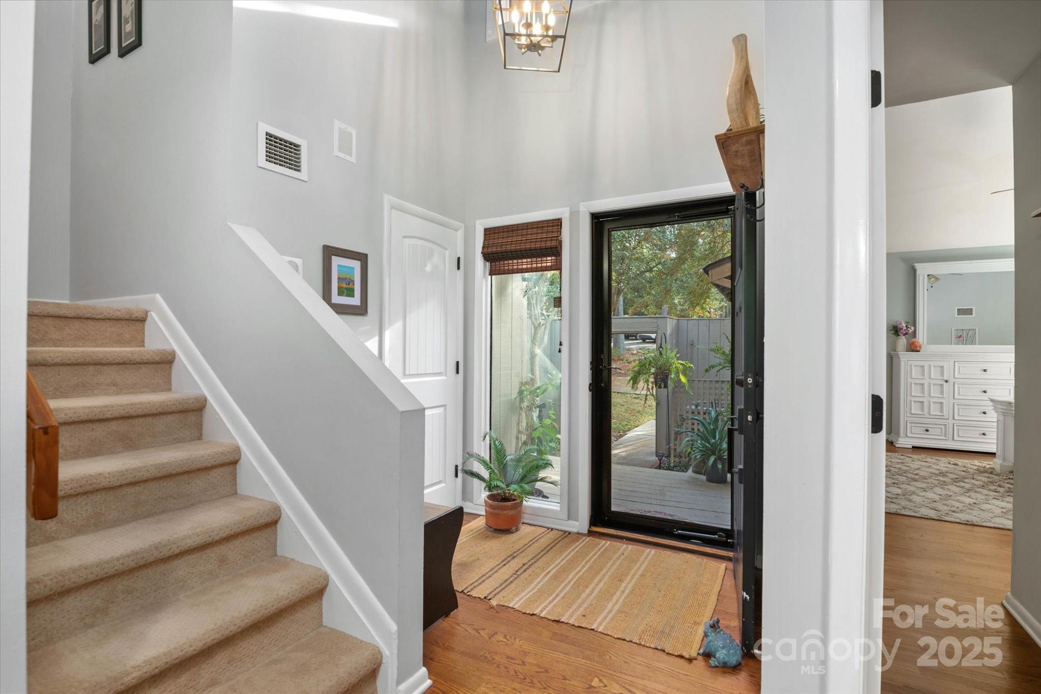 212 Riverview Terrace Clover, SC 29710 - Photo 23 of 48 a view of entryway and hall with wooden floor