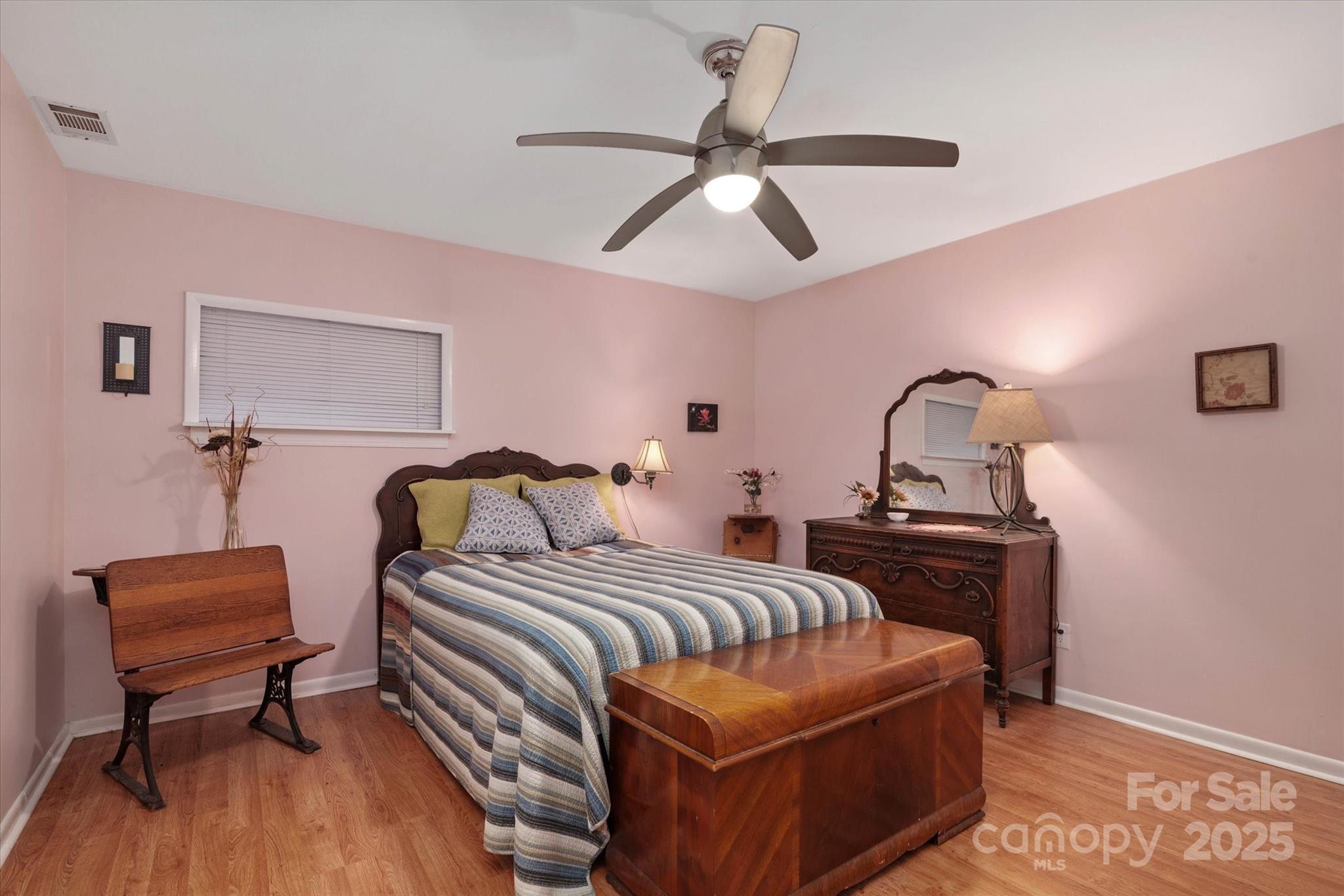 212 Riverview Terrace Clover, SC 29710 - Photo 42 of 48 a bedroom with a bed and a chair