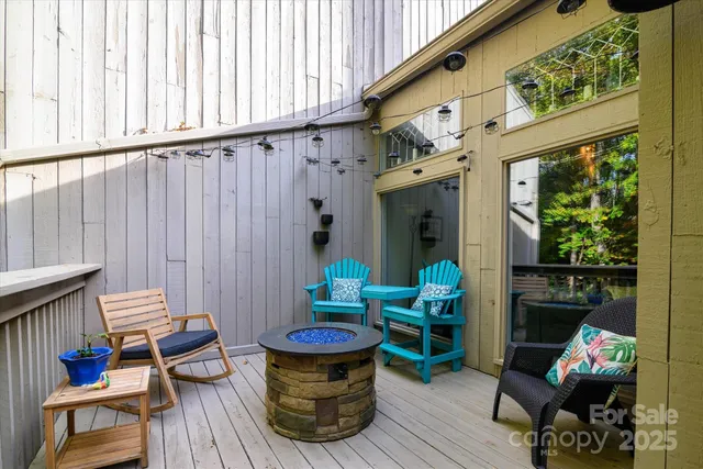 a view of roof deck with patio