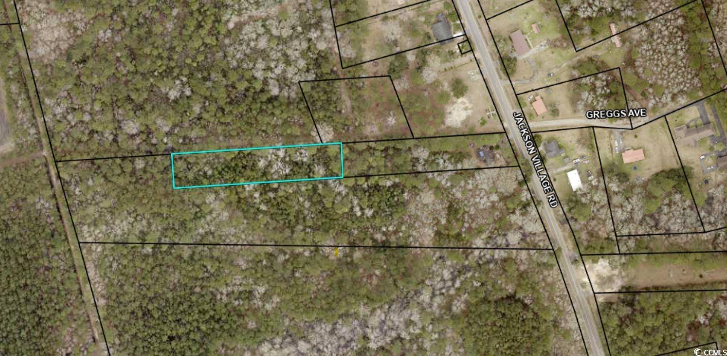 Aerial view of property's location featuring property parcel outlined
