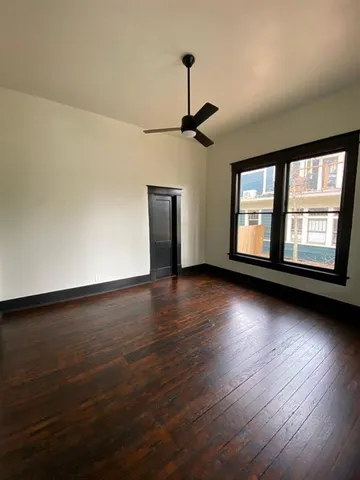 a view of livingroom with hardwood floor and window