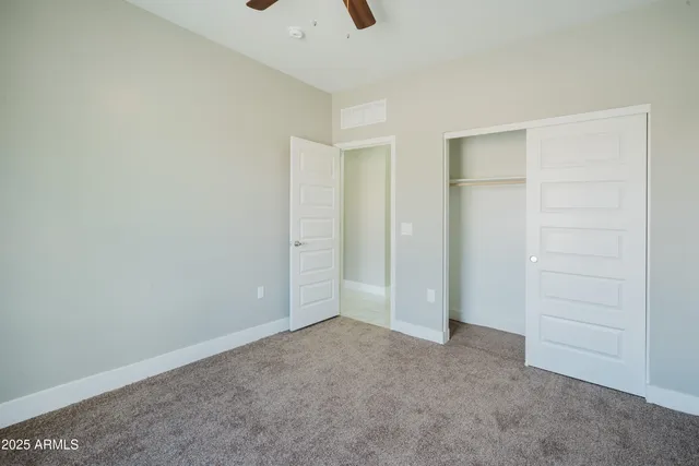 an empty room with closet