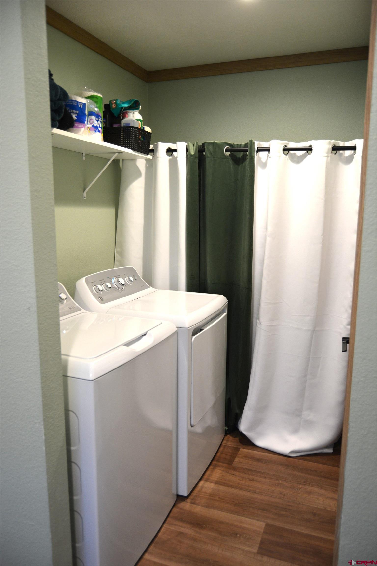 901 6530 Road, Unit 1030 Montrose, CO 81401 - Photo 8 of 22 a utility room with dryer and washer