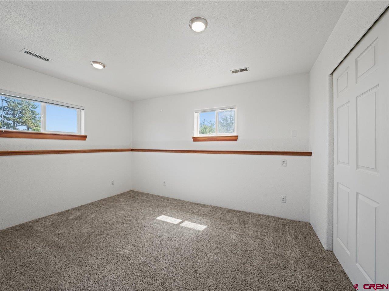 55 Valley View Road Ridgway, CO 81432 - Photo 16 of 40 a view of an empty room with a window