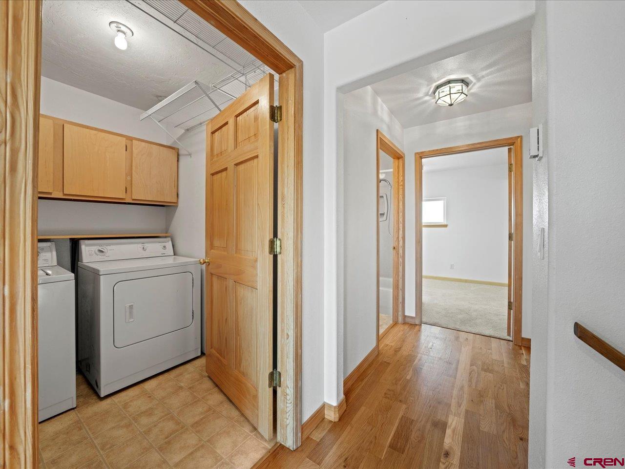 55 Valley View Road Ridgway, CO 81432 - Photo 18 of 40 a view of a storage & utility room with washer and dryer