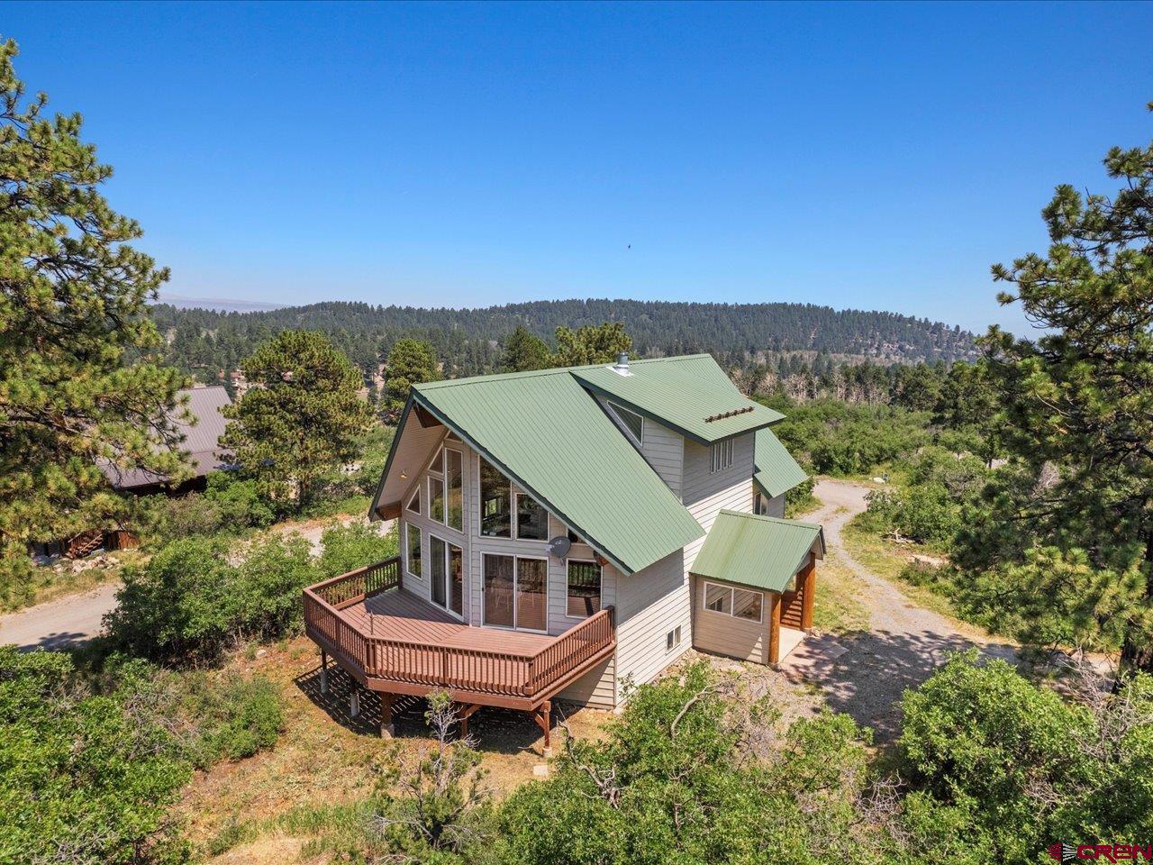 55 Valley View Road Ridgway, CO 81432 - Photo 3 of 40 an aerial view of a house with a yard