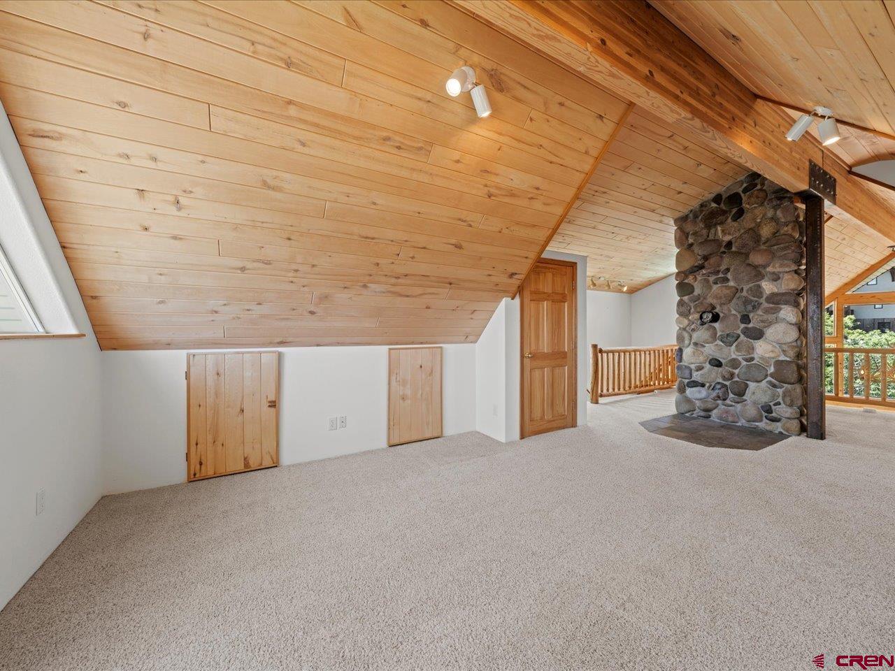55 Valley View Road Ridgway, CO 81432 - Photo 32 of 40 a view of a livingroom with an empty space and a garage