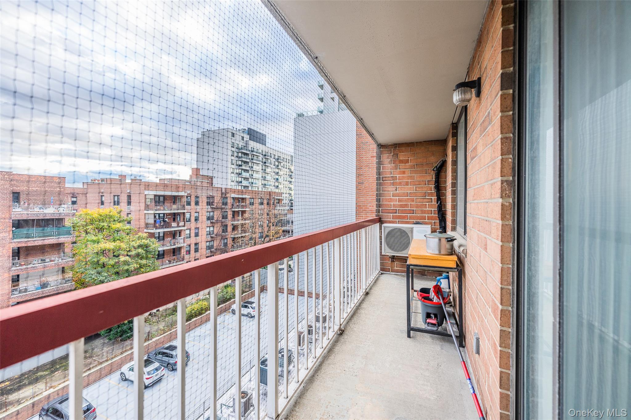 136-24 Maple Avenue, Unit 6F Queens, NY 11355 - Photo 16 of 29 a view of balcony with furniture